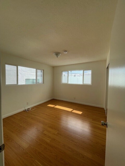 1st Bedroom with 2 large windows - 5462 Barton Ave