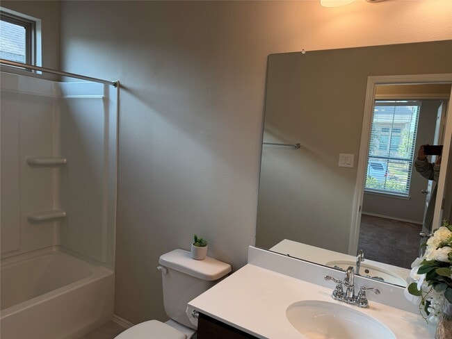 Building Photo - 8711 Windsong Trail Dr