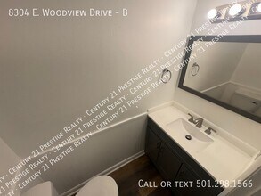 Building Photo - 8304 Woodview Dr N