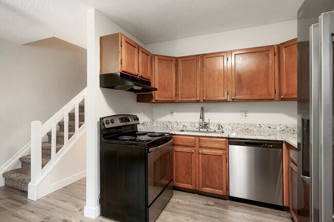 Kitchen with newer, stainless steel appliances - 11554 Community Center Dr