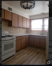 Building Photo - 9103 Lamon Ave