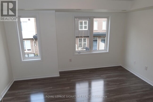Building Photo - 45-45 Heron Park Pl