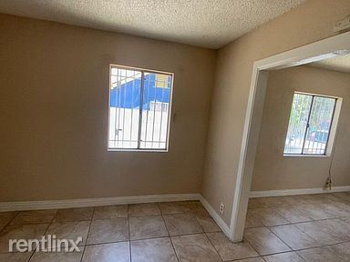 Building Photo - 2 br, 1 bath House - 715 E 87th Pl