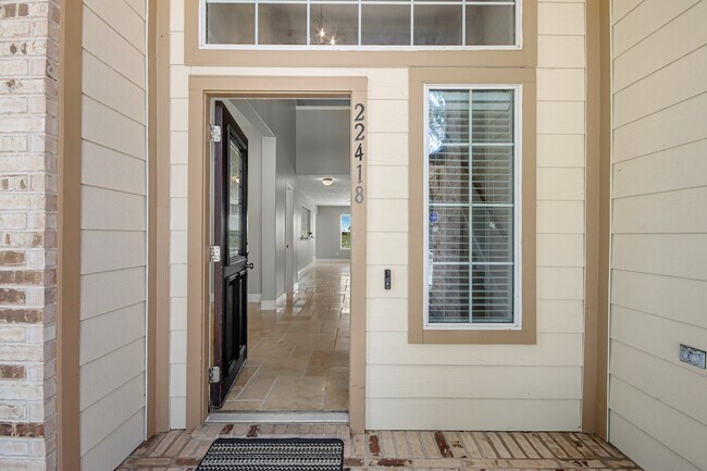 Inviting front entrance with front porch - 22418 Bridgestone Ridge Dr