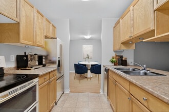 Building Photo - Creek Village Suites