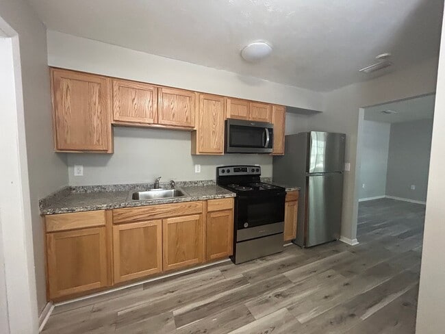 Building Photo - HALF OFF RENT!! 2/1 with Covered Porch nea...