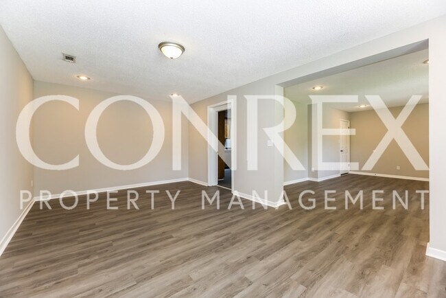 Building Photo - Beautiful Brick 4 Bedroom Ranch