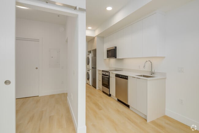 1BR, 1BA - 380SF - Kitchen and Bedroom - Raven Apartments