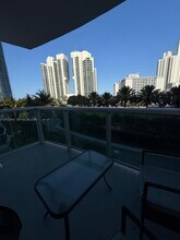 Building Photo - 19370 Collins Ave