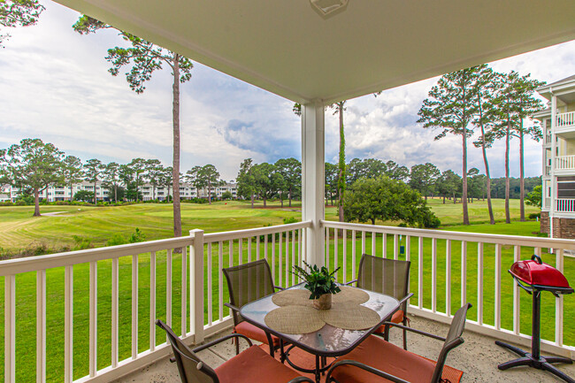 Patio with panoramic golf course views - 4890 Luster Leaf Cir