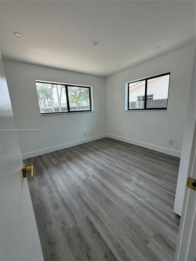 Building Photo - 8253 W 14th Ct