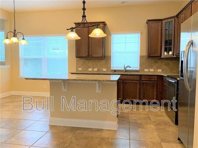 Building Photo - 8650 Tavistock Lakes Blvd