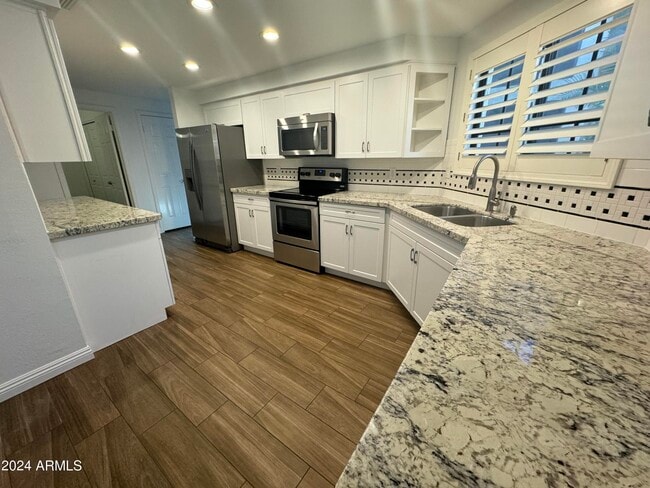 Building Photo - 9628 E Sutton Dr
