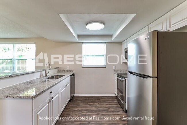 Building Photo - 6027 11th Ave