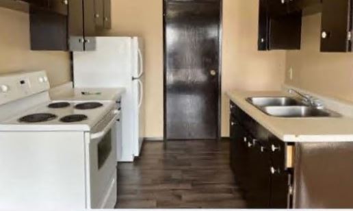 Photo du bâtiment - 3 Bed 1.5 Bath Unit in Olds, AB