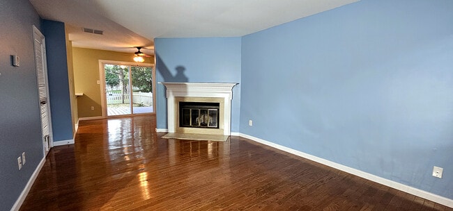 Open-Concept Main Level | Living room flows without interruption into the dining area - 43 Tynemouth Ct