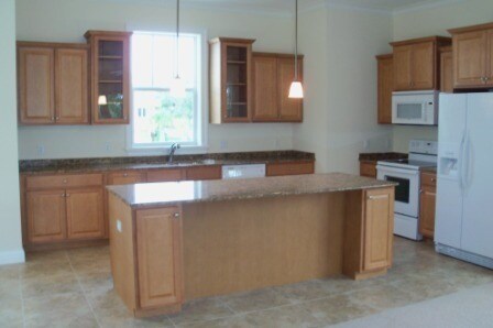 Building Photo - END UNIT WITH RIVER VIEW 3BR/3.5 BA CONDO