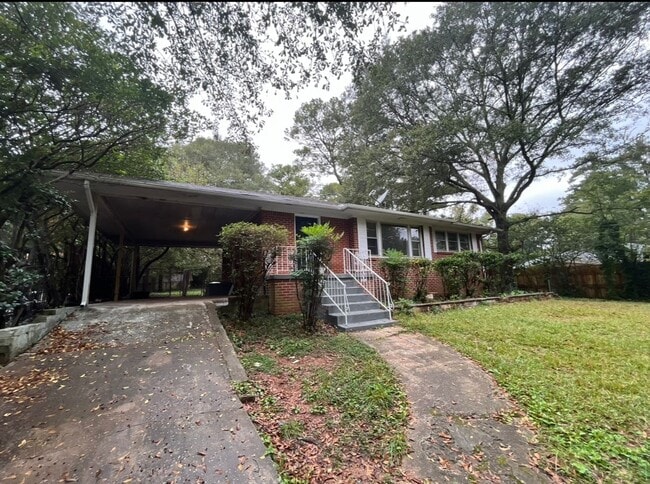 Building Photo - COMING SOON: Classic charm, peaceful living, your Forest Park retreat awaits in this spacious 3-b...