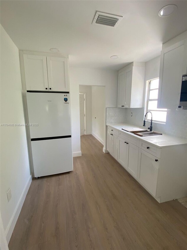 Foto principal - 5028 NW 3rd Ave