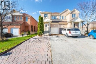 Building Photo - 6513 Song Bird Crescent