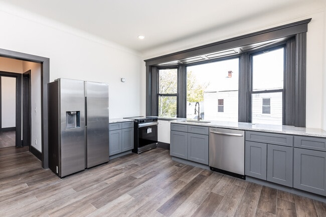 Kitchen is new and microwave/hood not installed yet. - 728 E McMillan St