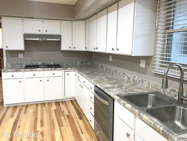 Building Photo - 3 br, 2.5 bath House - 5835 W. 10th Avenue
