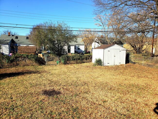 Large, Fenced Yard with Shed! - 1404 Carter St