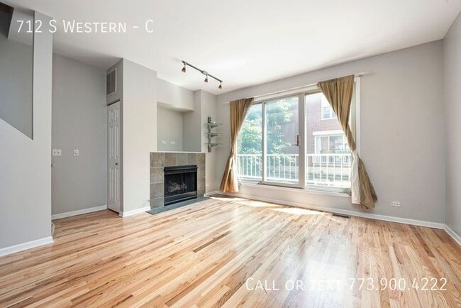 Building Photo - 712 S Western-C