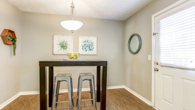Renovated Furnished Dining Room with Bar Table - The Block Townhomes