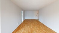 Located at 262-320 Kingswood Dr in Kitchener, Ontario, this well-laid-out 2-bedroom, 1-bathroom unit offers a comfortable and functional living space across a single floor. The open-concept kitchen and living room form the heart of the unit, with light-toned wood flooring extending through the main living areas and crisp white walls creating a clean, bright atmosphere. The kitchen features white cabinetry, dark countertops, an electric range, and light ceramic tile flooring, with a pendant-lit dining area that flows naturally into the living space. The spacious living room is bathed in natural light from large windows and a sliding glass door that opens onto a private balcony, offering views of surrounding greenery. The generously sized primary bedroom includes a double sliding-door closet, wood flooring, and a window with natural views, with convenient access to the bathroom. The second bedroom is also well-proportioned, featuring its own window with outdoor views and wood flooring. The bathroom is finished with classic white subway tile surrounding a full soaker tub and shower combination. A dedicated closet provides additional storage. Baseboard heating is present throughout, ensuring year-round comfort in this neatly maintained residential unit.