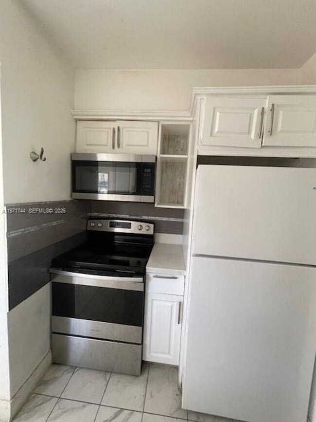 Photo - 121 NE 169th Terrace, North Miami Beach, FL 33162 House