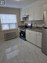 Building Photo - 1066 Coxwell Ave