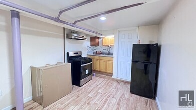 Building Photo - NEWLY RENOVATED 1 BEDROOM SEMI-BASEMNT  EA...