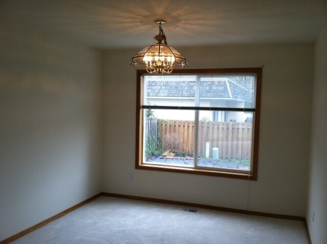 Building Photo - Love the Location in this Spacious 4-Bedro...