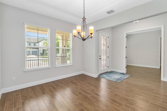 Dining, main entry & den - 16753 Gullfloss Ter