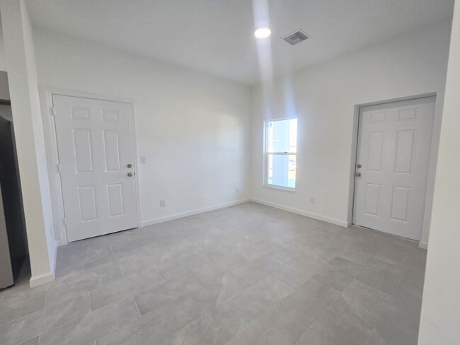 Building Photo - Brand-New Modern 2BR/2BA Home with Garage on Oversized Lot – Prime SW Lehigh Acres Location