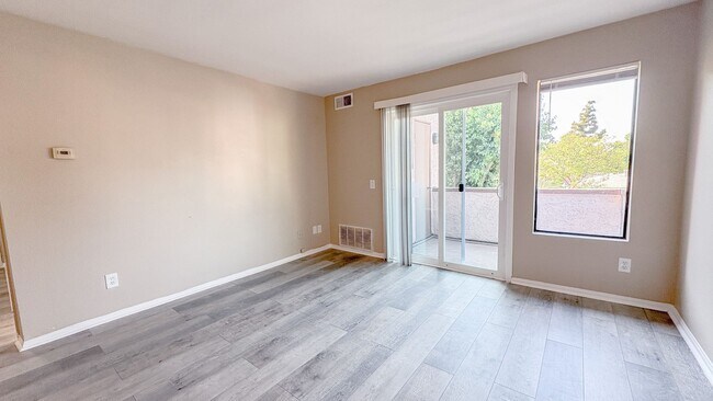 Building Photo - Low rent! Fully Renovated 2BR Condo Gated ...