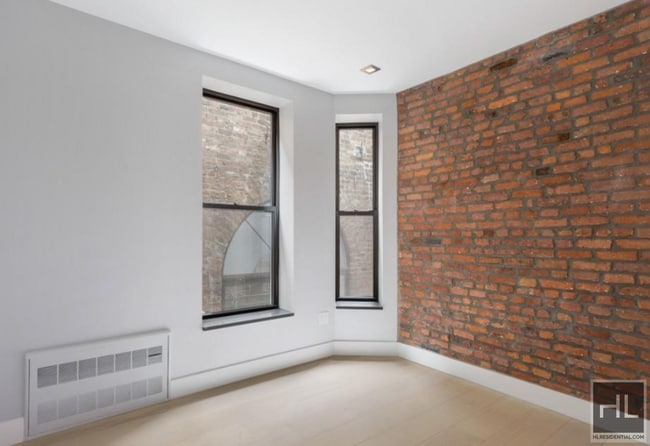 Building Photo - Renovated Lower East Side 3-Bedroom with E...