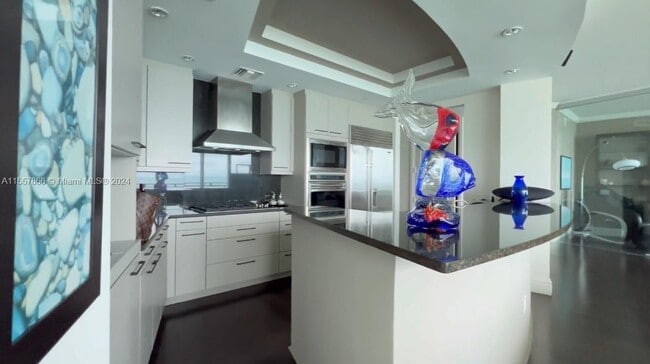 Building Photo - 10295 Collins Ave