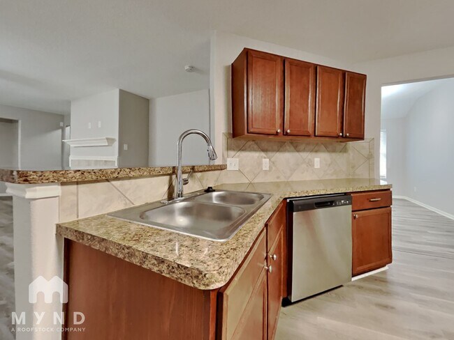 Foto del edificio - 9876 Lace Flower Way