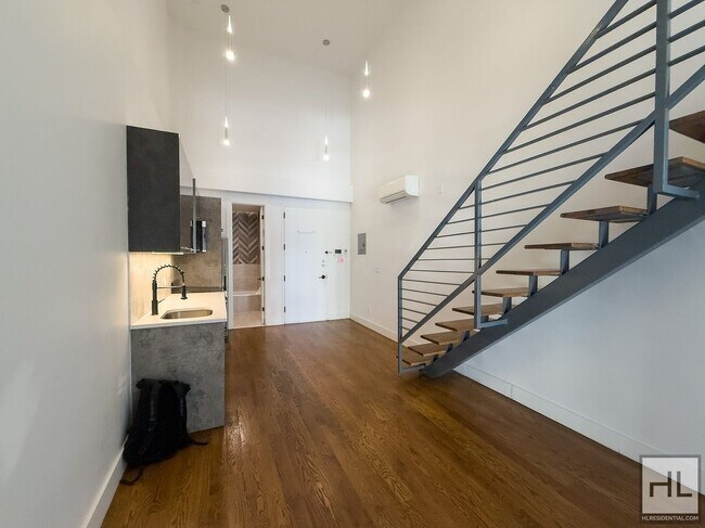 Building Photo - Stunning Two-Bedroom Duplex with Soaring 1...