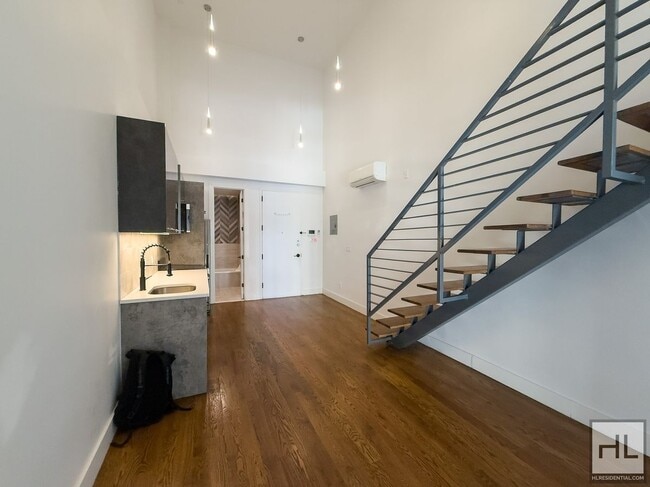 Building Photo - Stunning Two-Bedroom Duplex with Soaring 1...