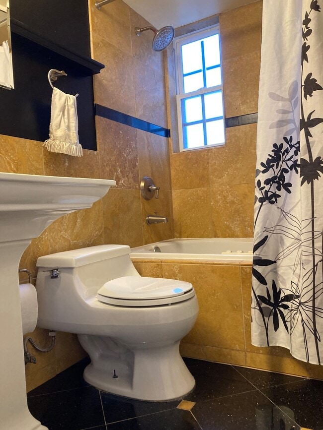 Clean bath with shower and tub - 2021 21st St N