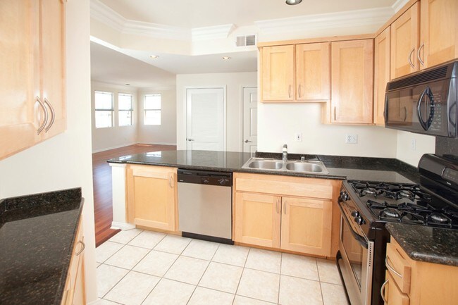 Kitchen: granite countertops/stainless steel - 108 S Clark Dr