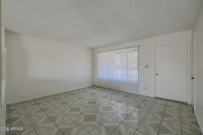 Building Photo - 3020 N 87th Ave
