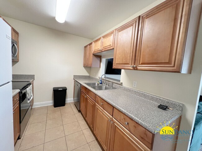 Building Photo - Furnished beautiful townhouse with community pool & playground!