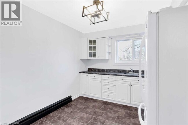 Building Photo - 11 Olympic Dr