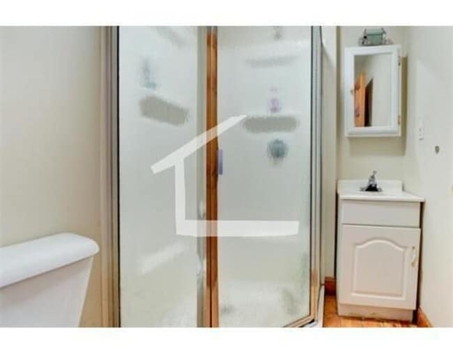 Building Photo - Mission Hill Area. Available September 1. In-Unit Laundry, Central Heat, Deck, Eat-in Kitchen.