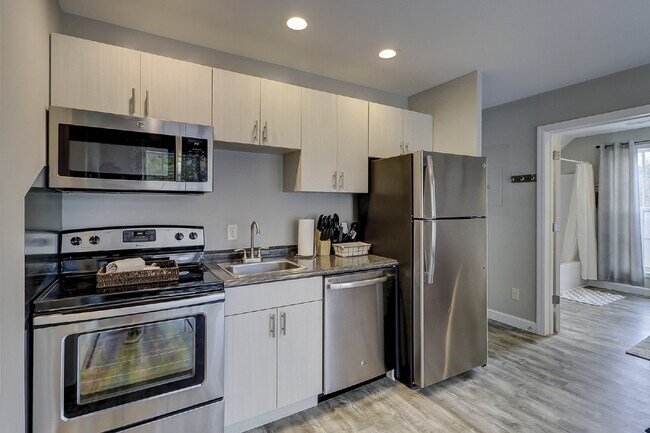 Building Photo - Modern, Furnished (or unfurnished), One Be...
