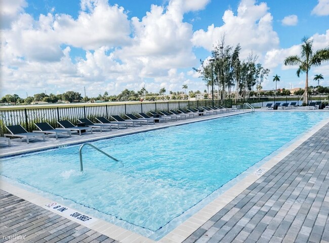 Foto del edificio - 2 br, 2 bath Condo - 1275 W 49th St NUEVO ...